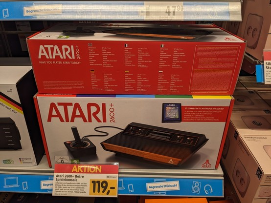 boxes with a modern version of ATARI 2600 for 119€ in a shelf