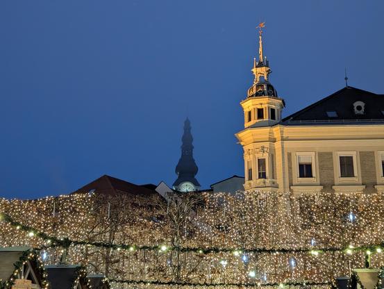 Detail photo of xmas market lights and surrounding buildings
