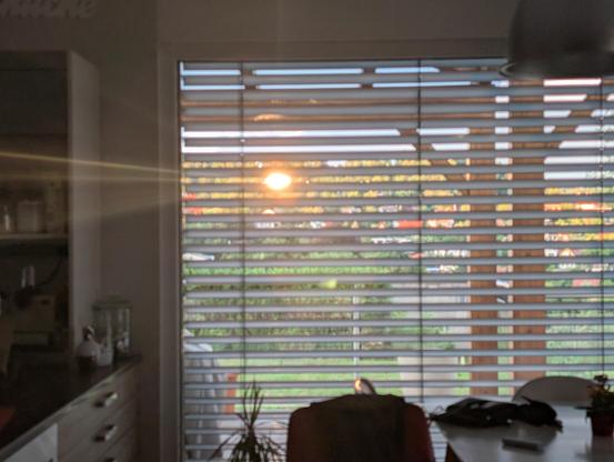 the incoming sunlight from the window that mirrors the sunlight