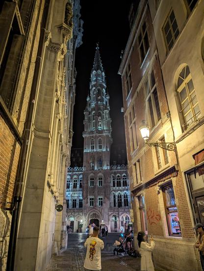 city hall tower between 2 other buildings