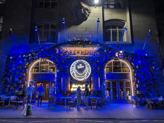 colorful lit pub front
